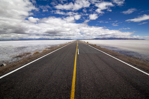Straight road through salt lake, Salinas Grandes, Argentina