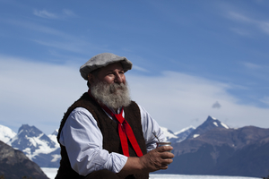 Gaucho with mate tea, cap, red tie, Patagonia, Argentina