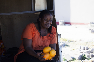 Woman selling oranges, Botswana