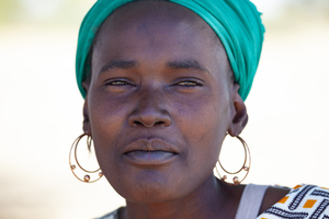 African woman with green headscarf, Botswana