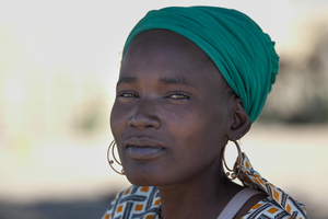 African woman with green headscarf, Botswana
