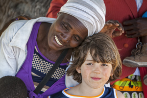 African woman and white boy, Botswana