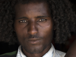 Man with curls, magic look, shining eyes, Ethiopia, Africa