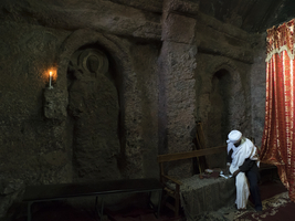 Priest in rock church, Lalibela, Ethiopia, Africa
