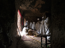 Men drumming and singing, Bet Giyorgis rock church, Lalibela, Ethiopia, Africa