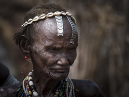 Old woman with headdress