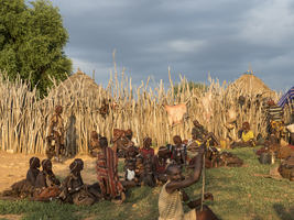 Villagers from the Hamar tribe sitting on the ground, Omo region, Ethiopia, Ethiopia, Africa