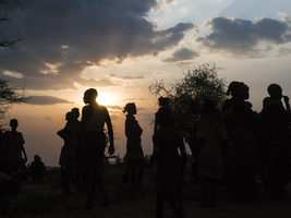 People from the Hamar tribe in the backlight in the evening, Omo region, Ethiopia, Africa