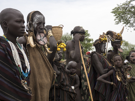 Group, men, women and children from the Mursi tribe, traditional clothing, Ethiopia, Africa