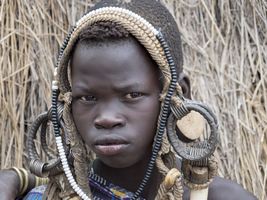 Boy from the Mursi tribe with headdress, portrait, Ethiopia, Africa