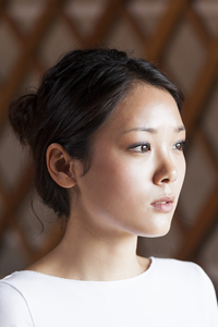 Young Mongolian woman with sensual look, Mongolia