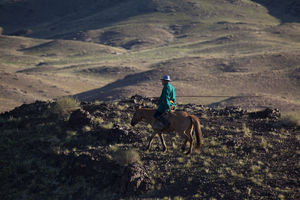 Lone rider in mountains