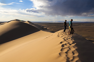 Group people on the dune, Hongor, Gobi, Mongolia