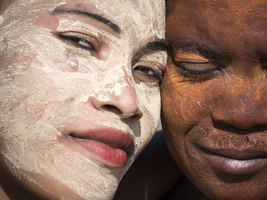 Women with face mask smiling, Vezo tribe, Madagascar