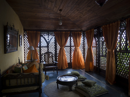 Old luxury room, yellow curtains, oriental walls, Emerson Hurumzi Hotel, Zanzibar, 2017