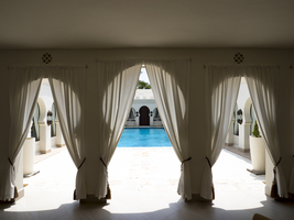 Palace with curtains and swimming pool, Baraza Luxury Resort, Zanzibar
